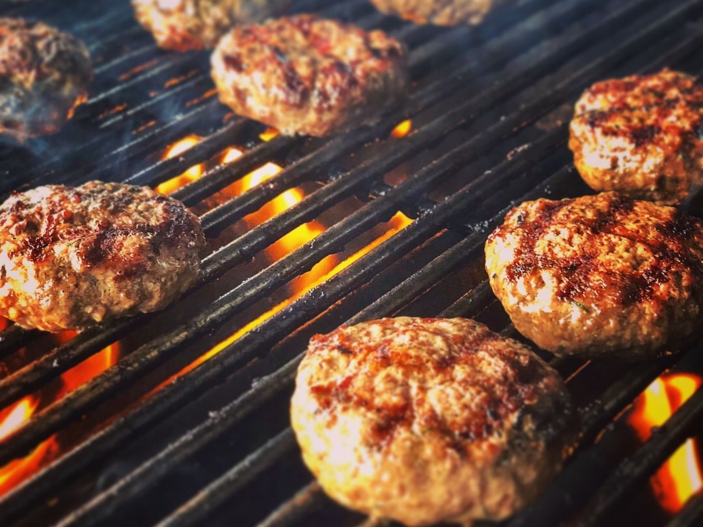 Oak Barn Beef burgers on the grill, dry aged, oakbarnbeef.com