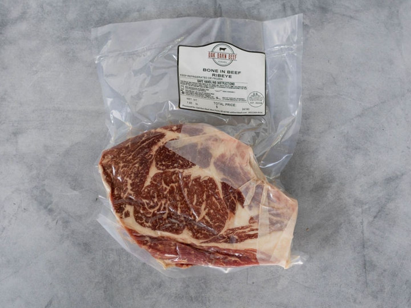 Oak Barn Beef Bone-In rib eye raw, oakbarnbeef.com