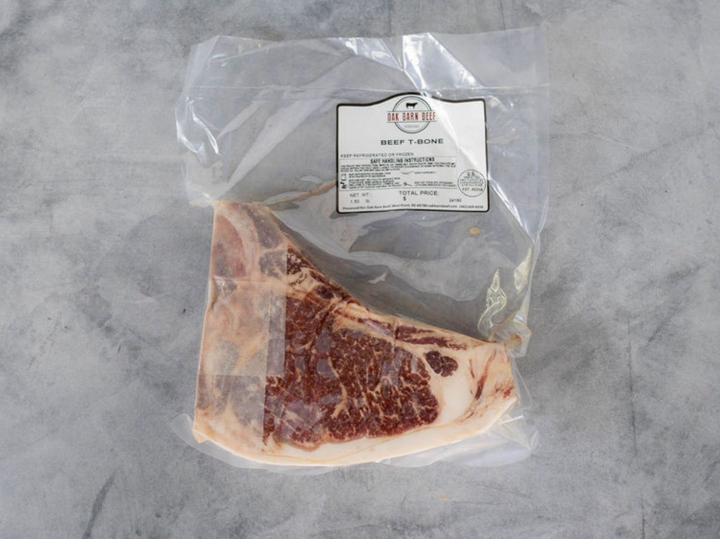 Oak Barn Beef T-Bone steak raw - Nebraska Dry Aged Beef, oakbarnbeef.com