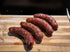 Oak Barn Beef, Beef Brats cooked, oakbarnbeef.com