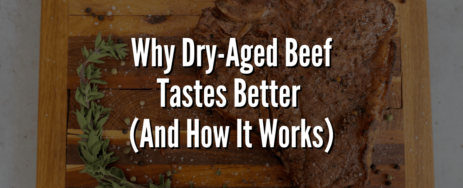 Cooked dry-aged steak on a wooden cutting board with fresh herbs and peppercorns, overlaid with the text: Why Dry-Aged Beef Tastes Better (And How It Works).