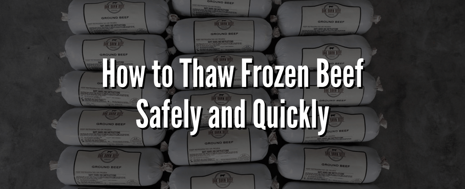 Stacks of Oak Barn Beef ground beef packages on a gray surface with text overlay: How to Thaw Frozen Beef Safely and Quickly.