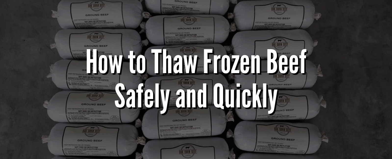 Stacks of Oak Barn Beef ground beef packages on a gray surface with text overlay: How to Thaw Frozen Beef Safely and Quickly.